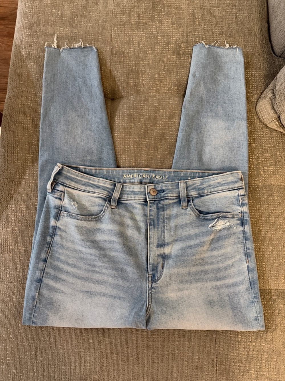 American Eagle Outfitters Light Wash Skinny Jeans with Raw Hem